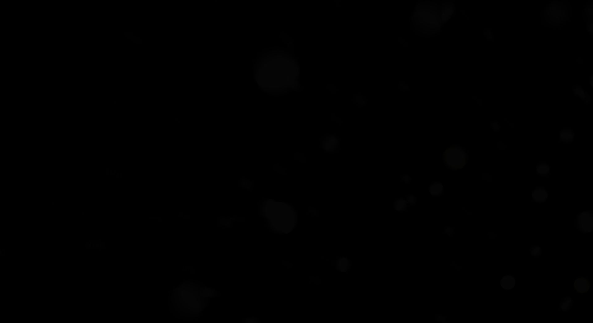 Image sombre avec un fond noir uniforme, contenant de subtiles formes floues et des ombres diffuses réparties de manière aléatoire. Les contours de ces formes sont à peine perceptibles, créant une ambiance minimaliste et mystérieuse. Cette image est utilisée comme cadre de départ d'une vidéo.